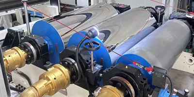 Three-roll calender